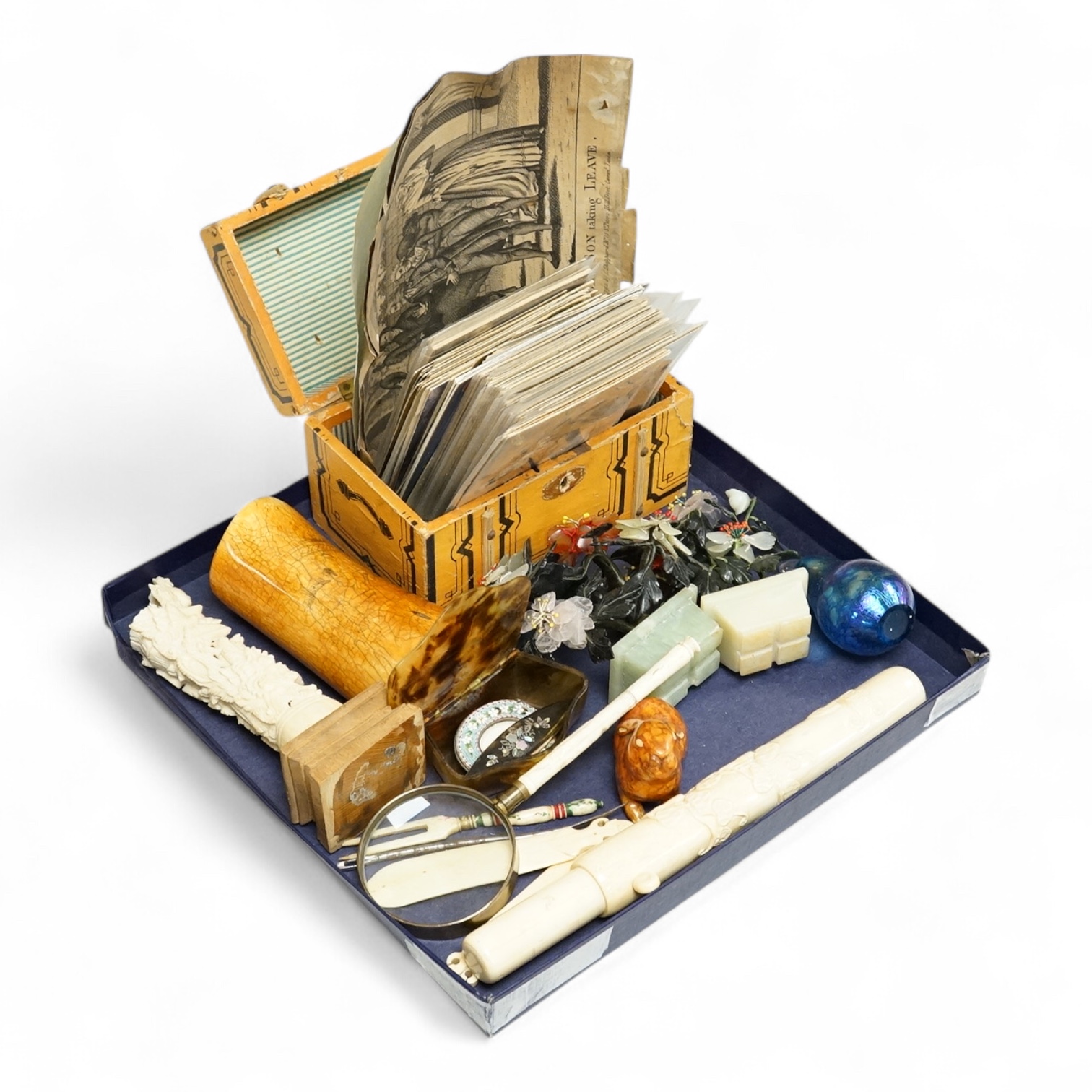 A group of mixed collectables including postcards, bone items, Chinese miniature hardstone flowers, etc.